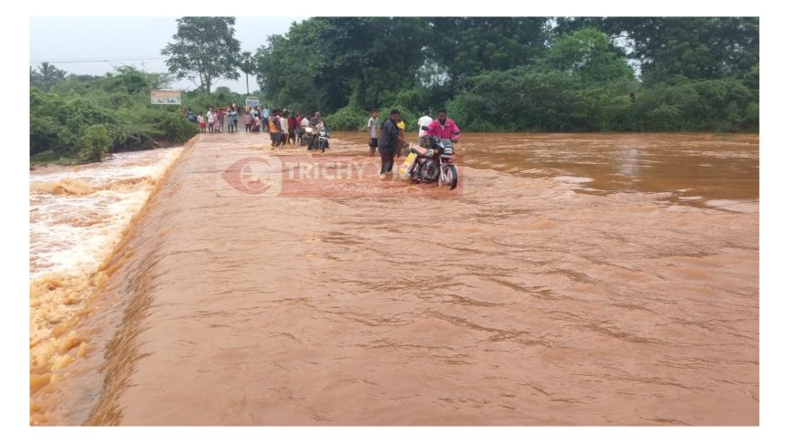 தரைப்பாலத்தை மூழ்கடித்தவாறு ஆர்ப்பரித்து சென்ற மழைநீர் - ஆபத்தை உணராமல் சென்ற மக்கள்.